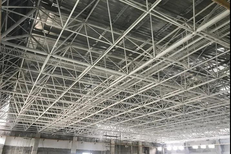 gym Column-free steel grid structure used in a modern gymnasium roof design