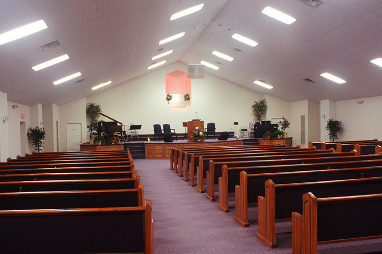 Architectural steel design for prefab church building featuring clear span interior and modern exterior finishes