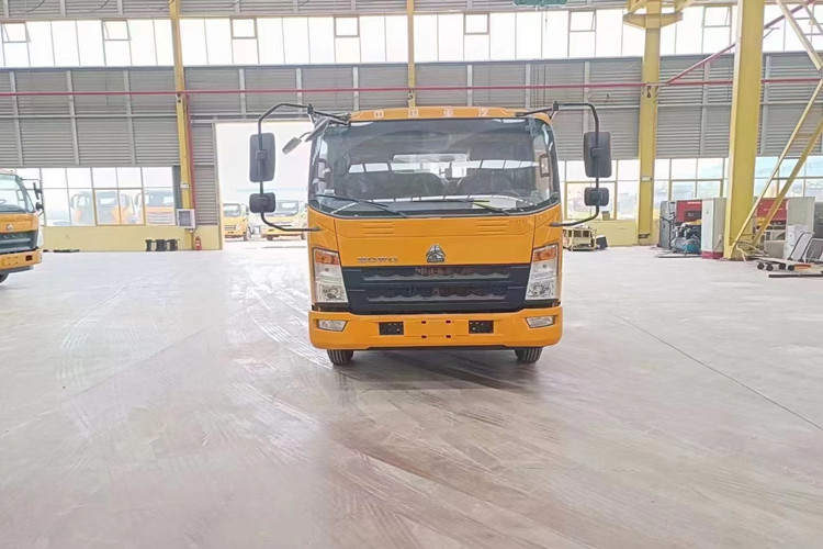 HOWO truck assembly line inside a spacious prefabricated steel structure workshop