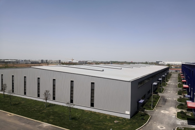 Interior framework of an industrial warehouse showing high clearance