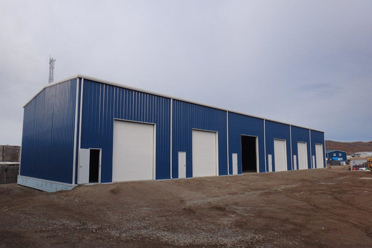 Modular assembly of the steel structure warehouse showing precision engineering and secure framing