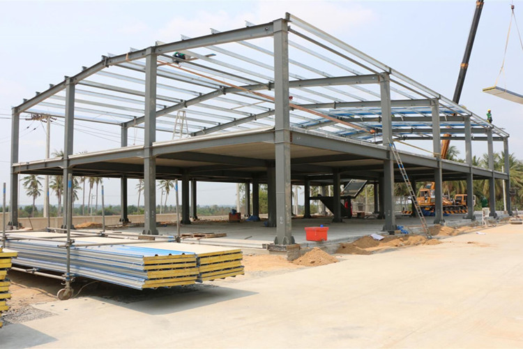 Internal framework of a warehouse steel structure highlighting solid galvanized purlins