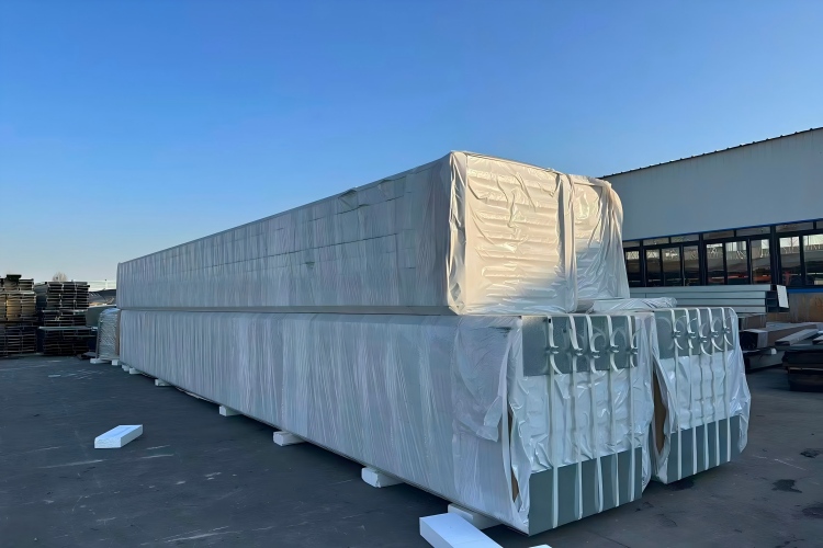 Palletized enclosure panels demonstrating protective wrapping techniques
